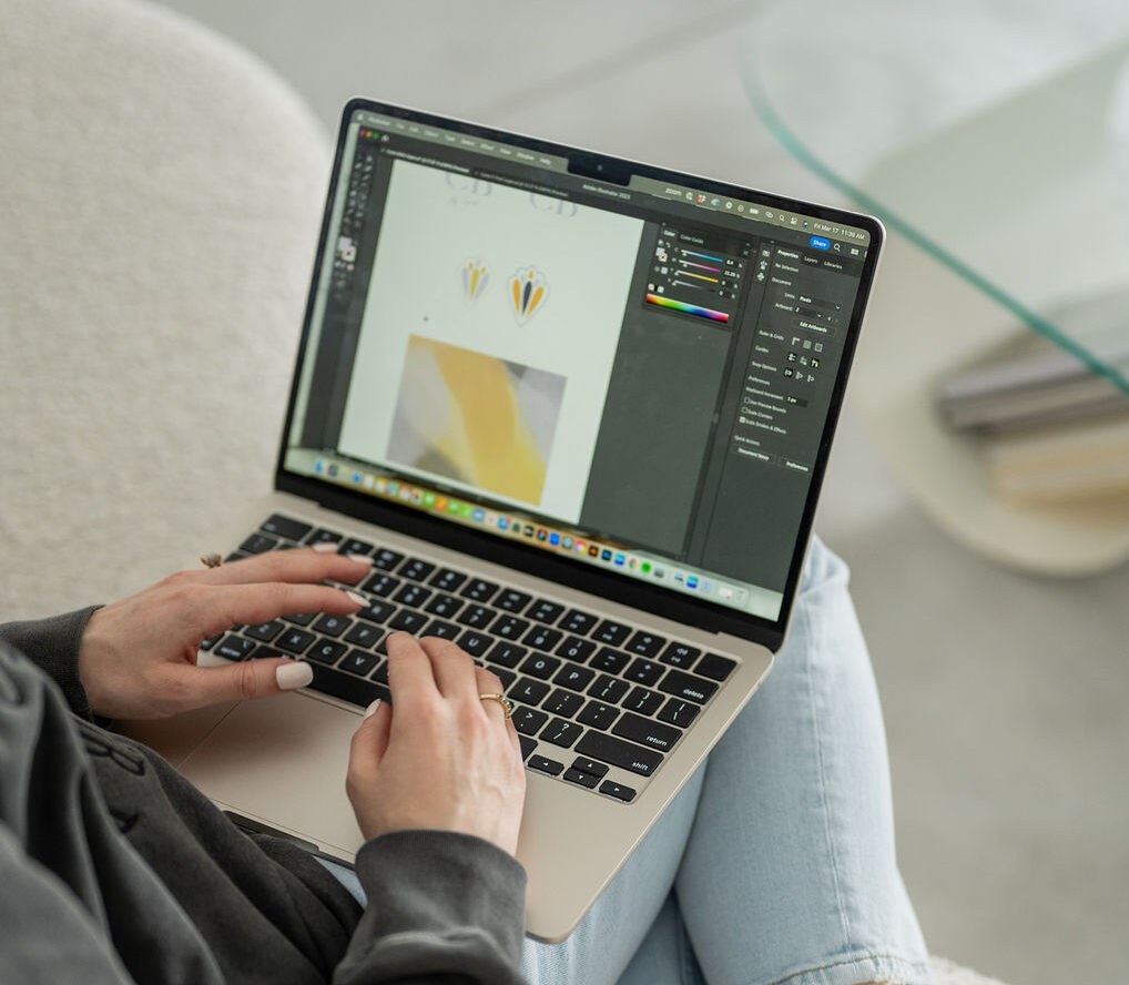 Why is Branding Important? Emma Designing Branding on Laptop
