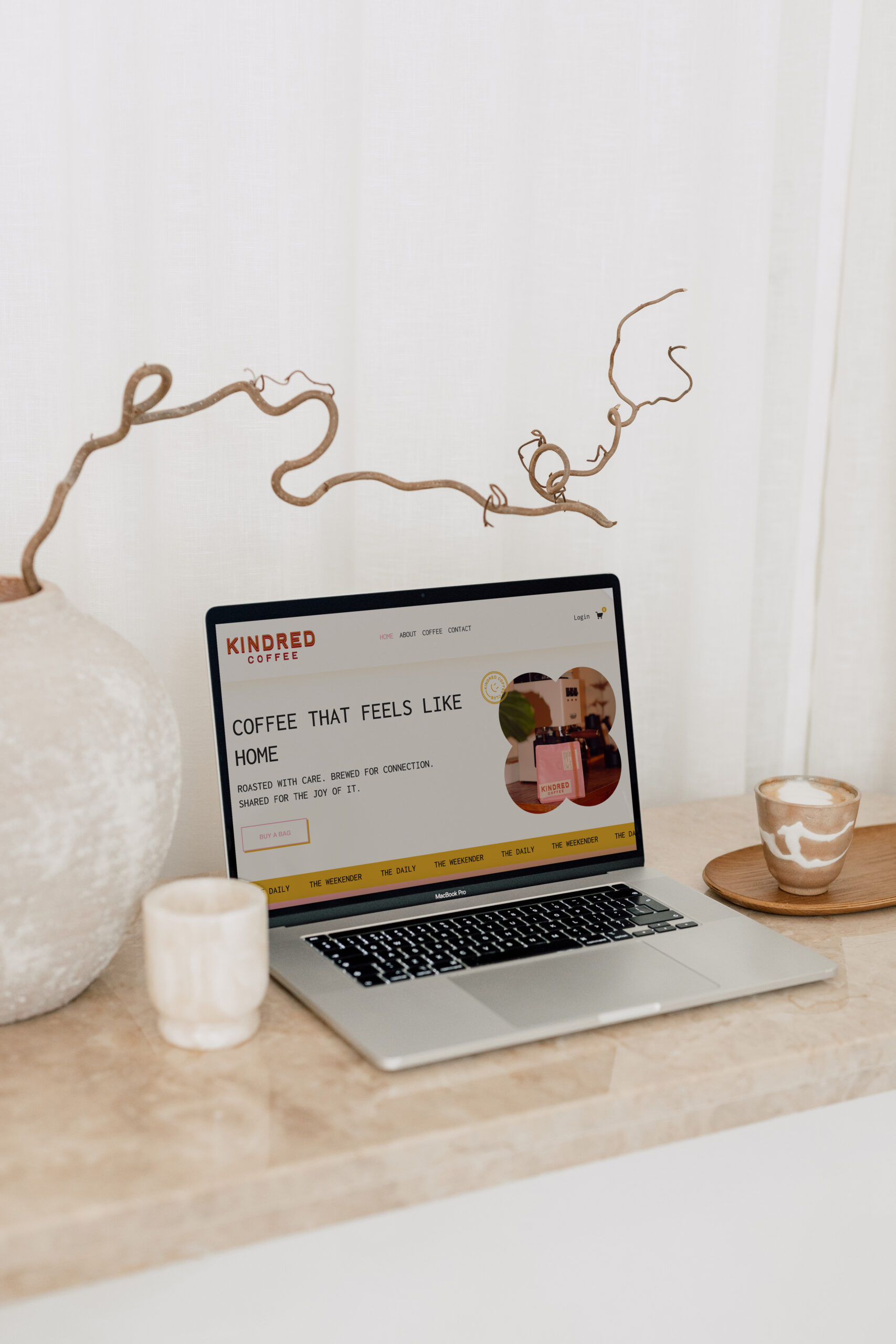 Open laptop screen showing custom website for an online coffee shop