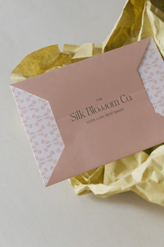 Stationery envelope with updated patterns and business name.