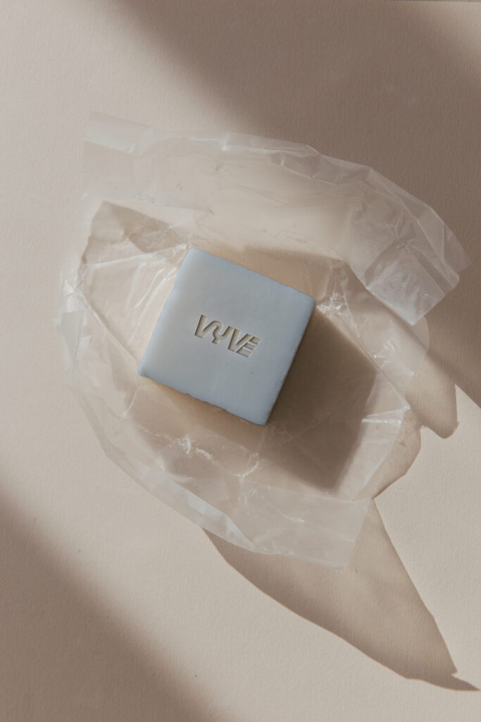 VYVE logo embossed on a bar of soap.