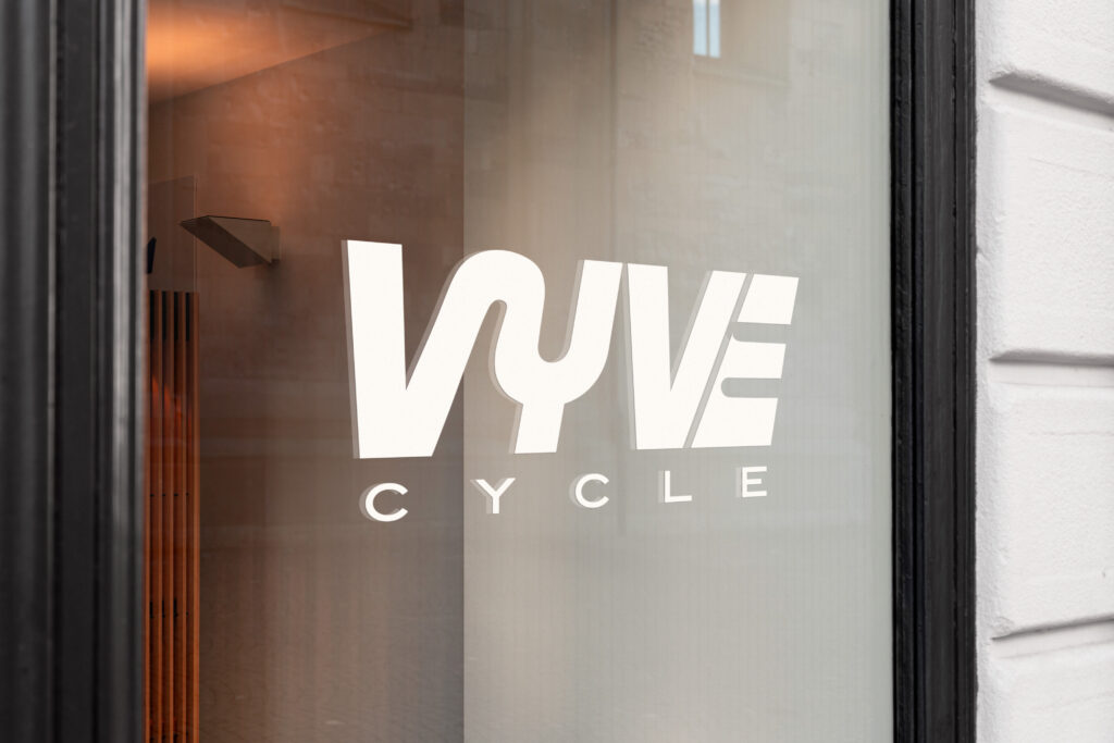 VYVE Cycle Studio logo applied to a window panel.