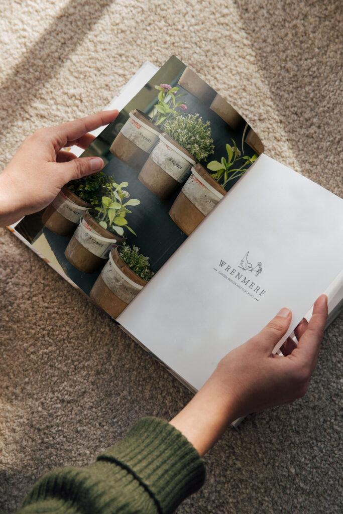 A magazine spread showcasing the Wrenmere logo.