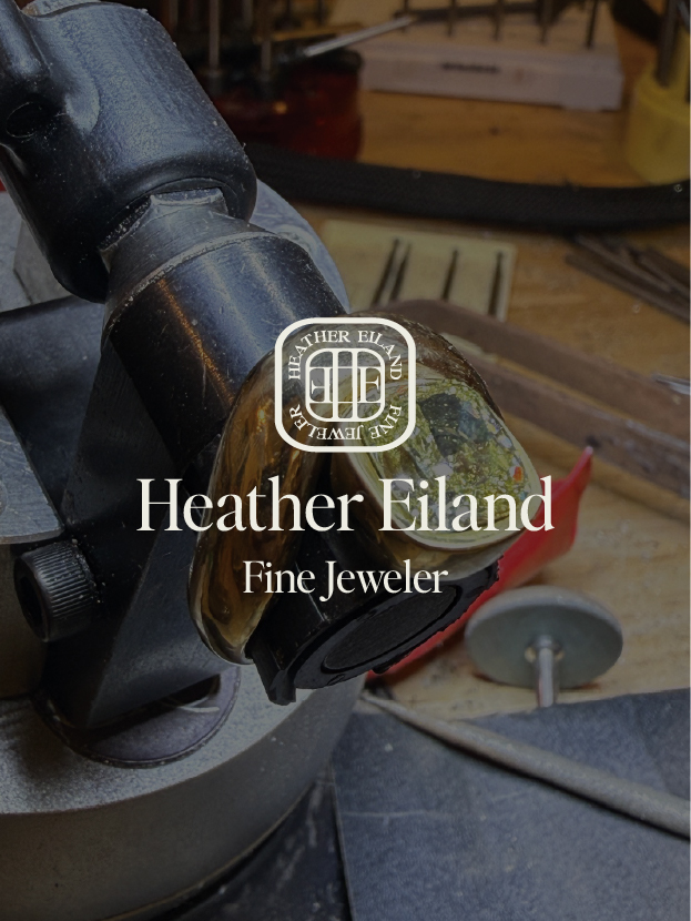 Heather Eiland main logo on a behind-the-scenes background.