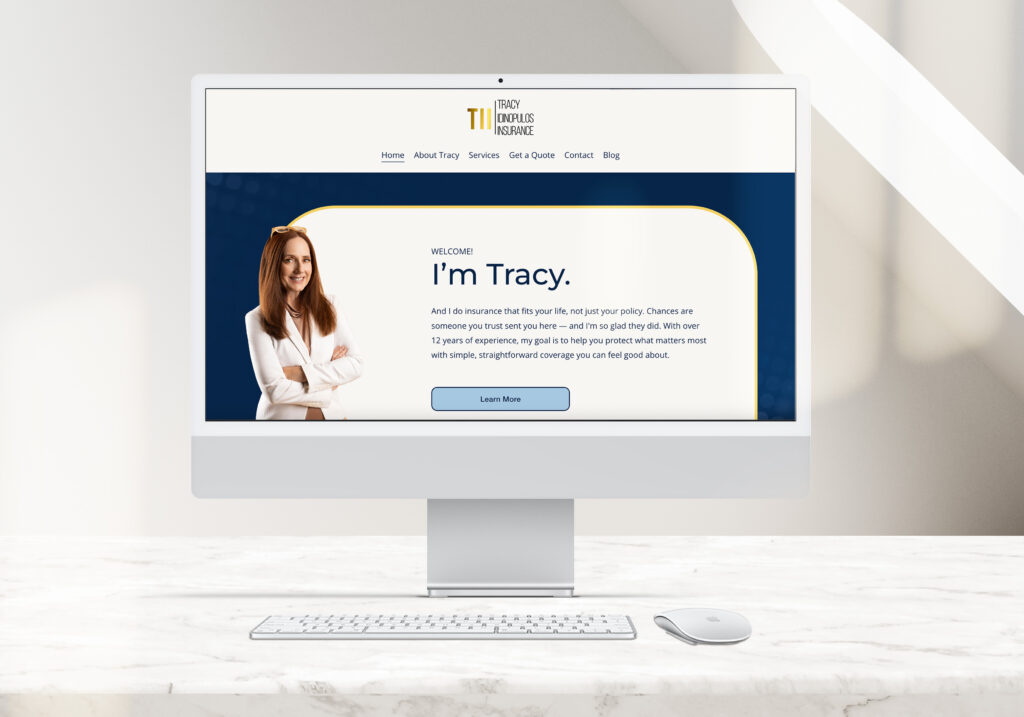 Desktop computer showing Tracy’s website home page