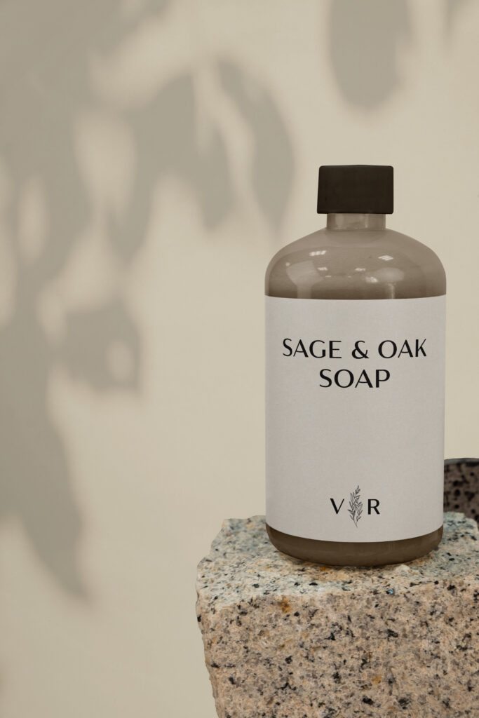 Round bottle with a Village Refillery submark logo in its label.