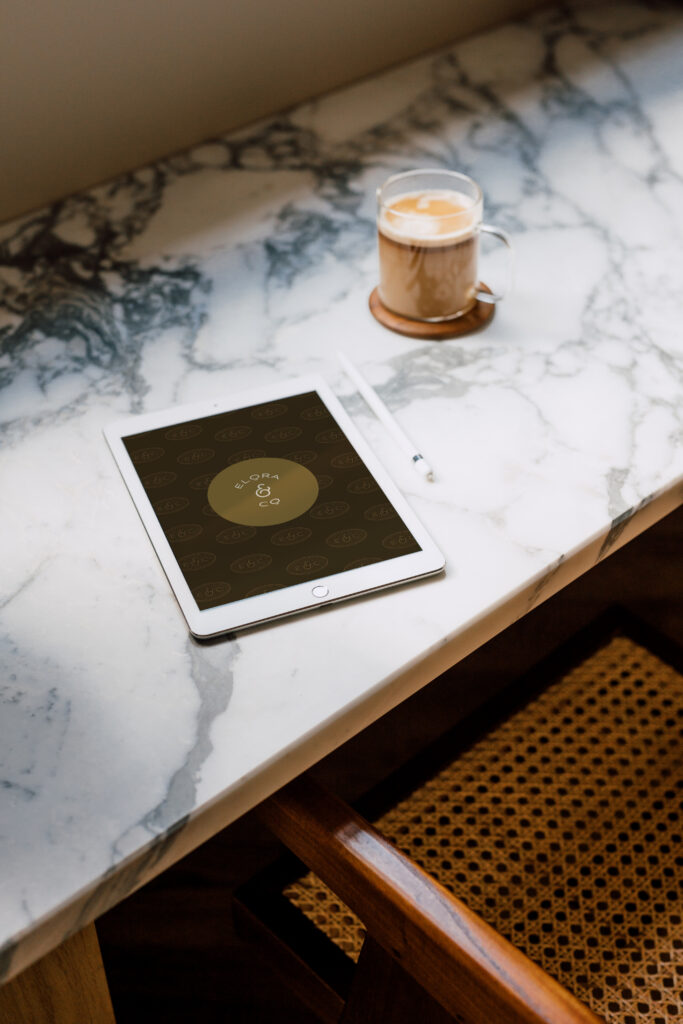 A tablet display of the Elora & Co pre-made brand kit on a desk.
