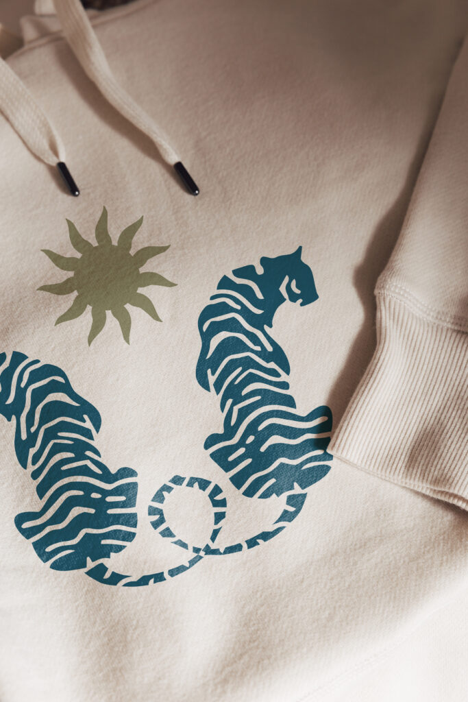 A close-up of the North Wellness logo on a sweater.