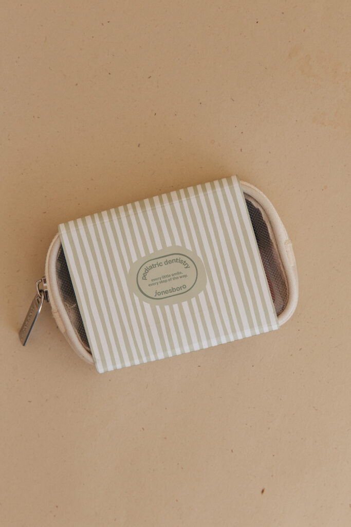 Calm dentist branding featured on a cosmetic bag.