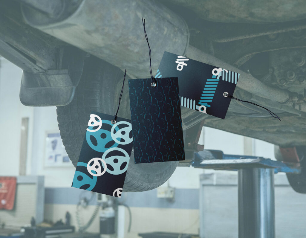 Card tags featuring logo and icon patterns from a mobile mechanic branding.