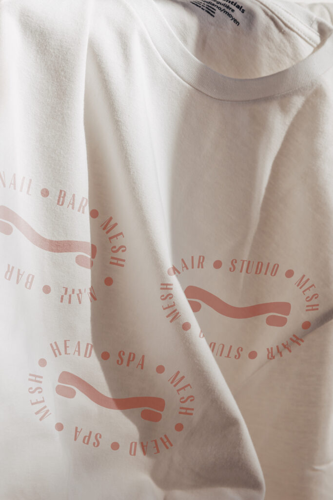 Custom apparel featuring the Mesh Hair logo design