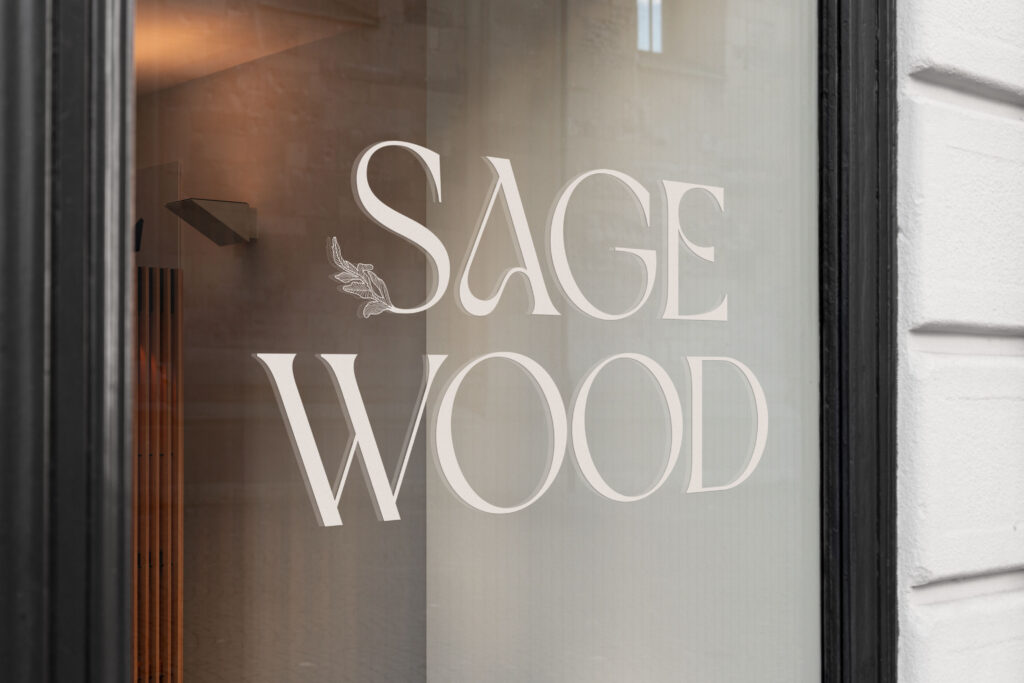 Glass panel featuring the Sagewood brand logo