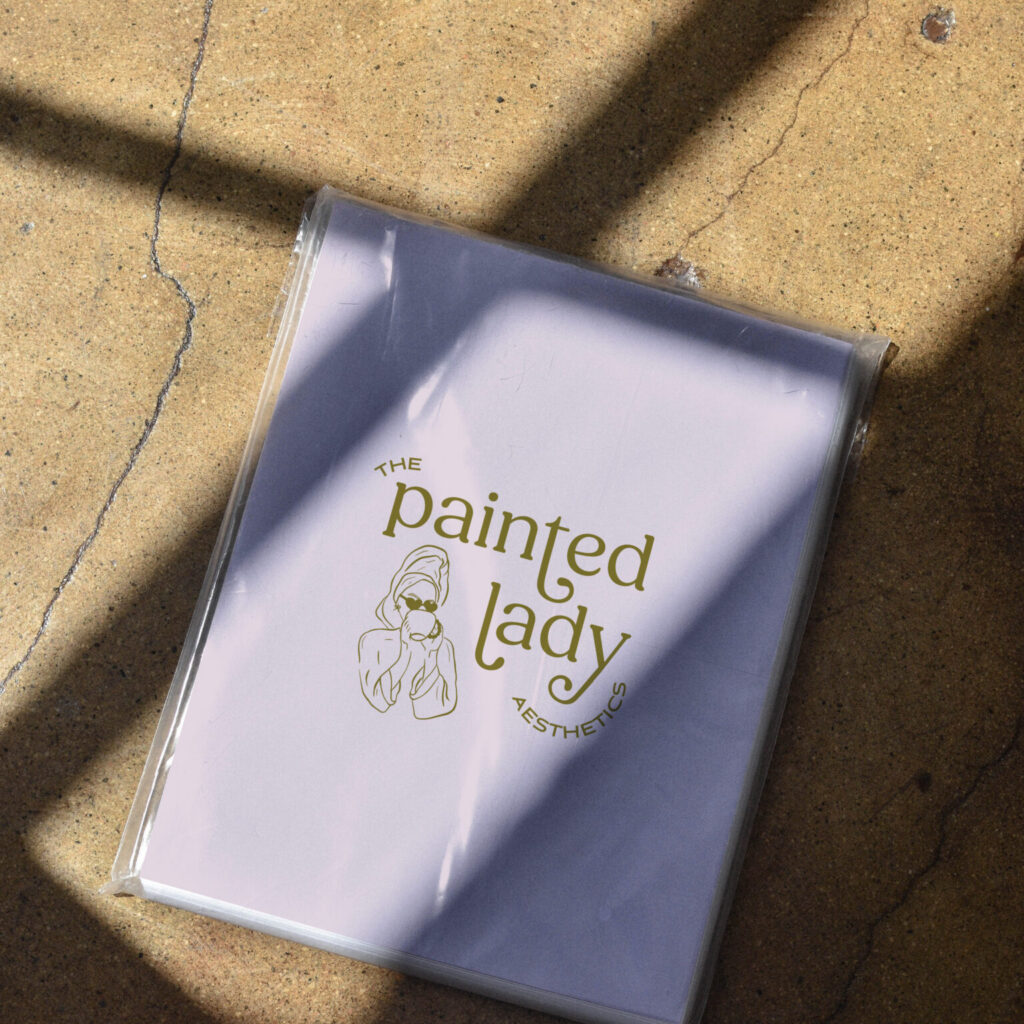 The Painted Lady nail salon logo printed on a white canvas