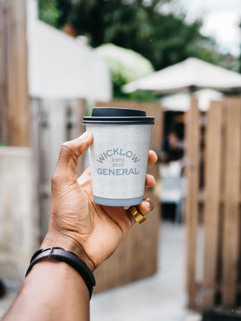 The Wicklow texture and logo featured as a paper cup design.