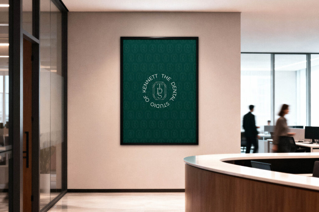 Framed logo of The Dental Studio displayed inside the dental office.