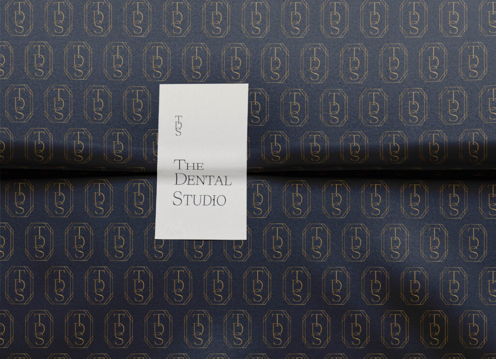 The Dental Studio logo and custom background pattern create a polished and professional brand presence.
