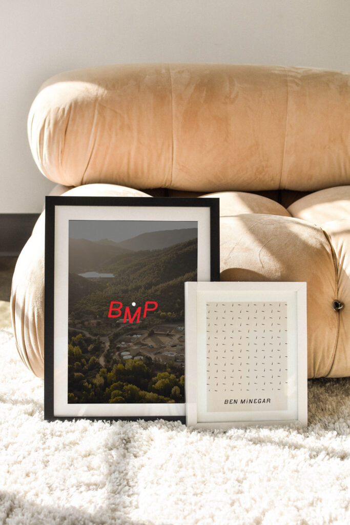 Ben Minegar brand visuals displayed in a photo frame