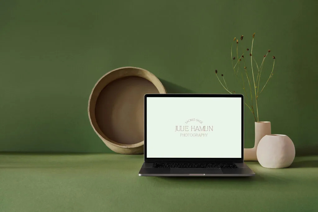 Sacred Sage Photography logo design displayed on a laptop screen