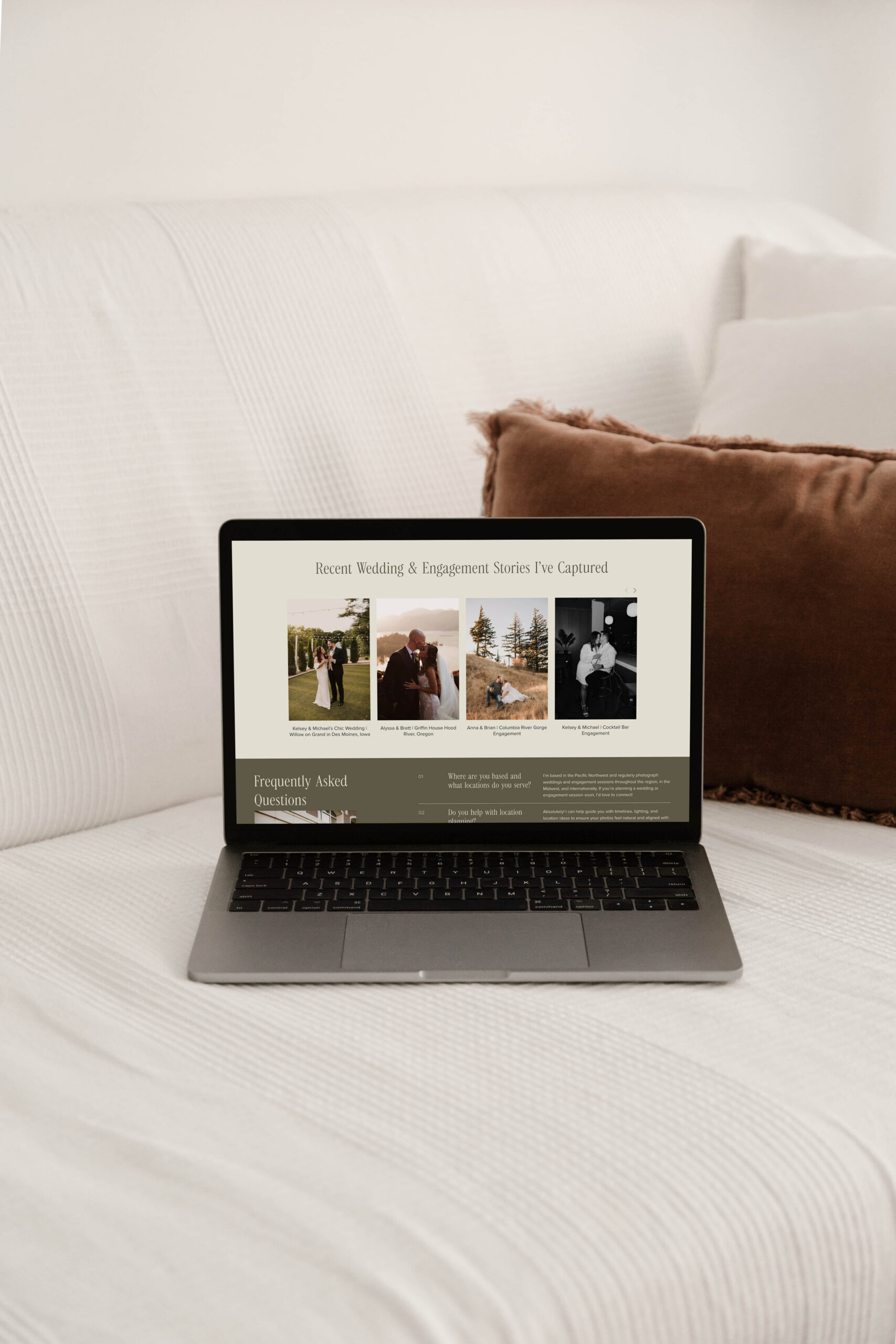 Elle May's custom photography website homepage displayed on a laptop screen.